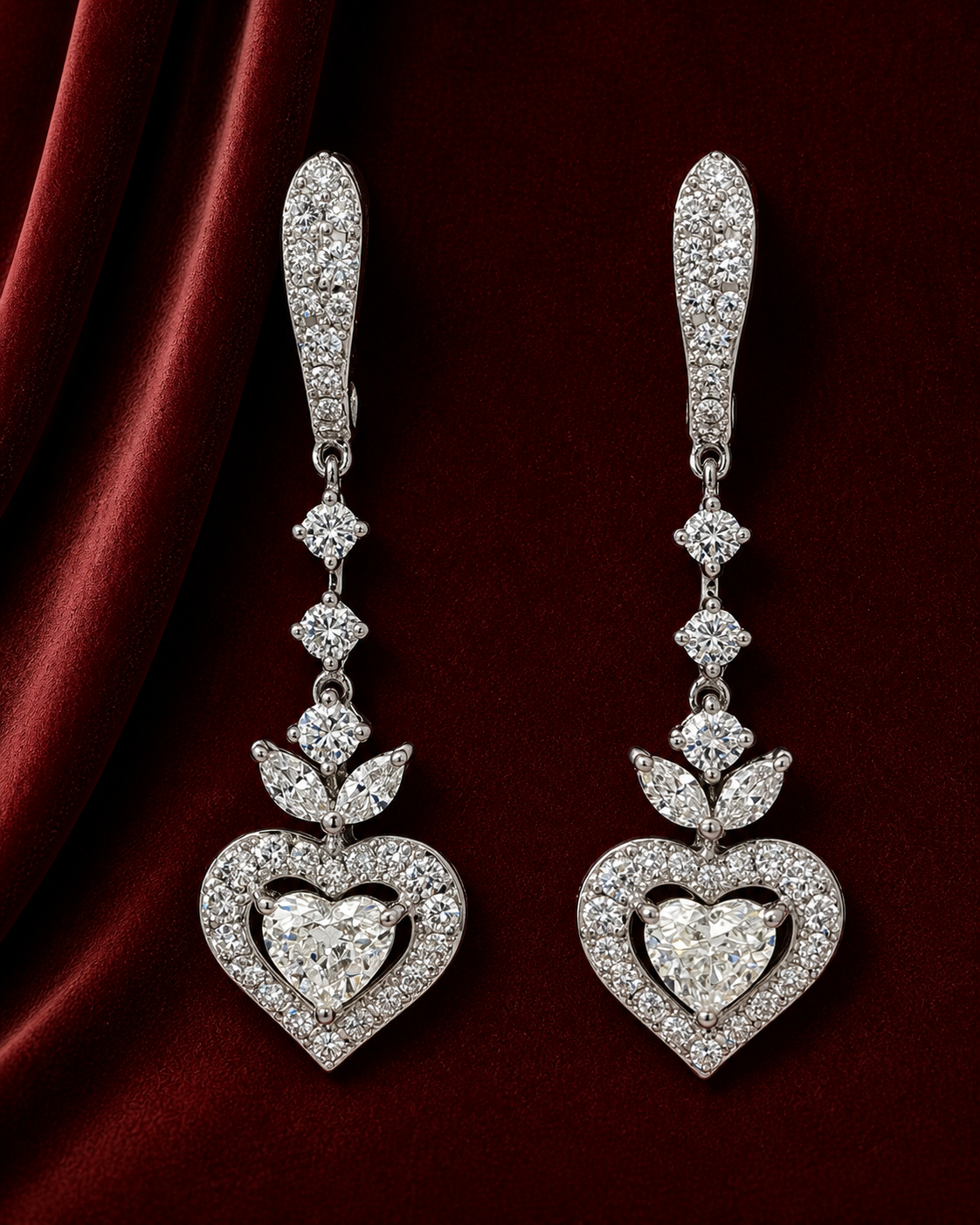 EES4104 heart and leaf diamond drop earrings on deep burgundy velvet