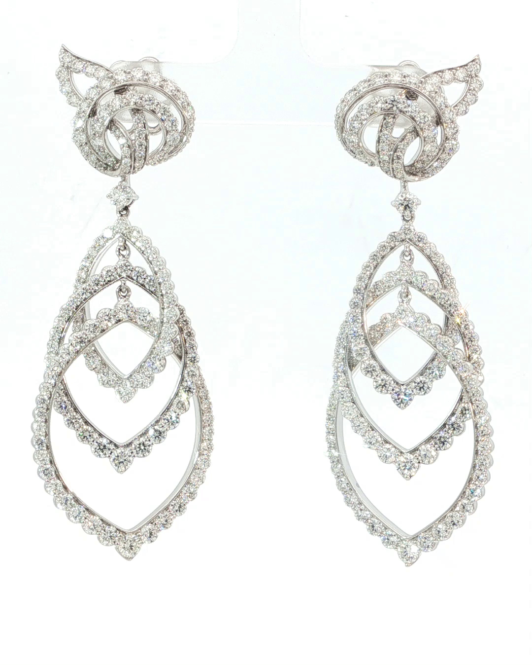 EES5821 interlocking teardrop diamond earrings on a white background