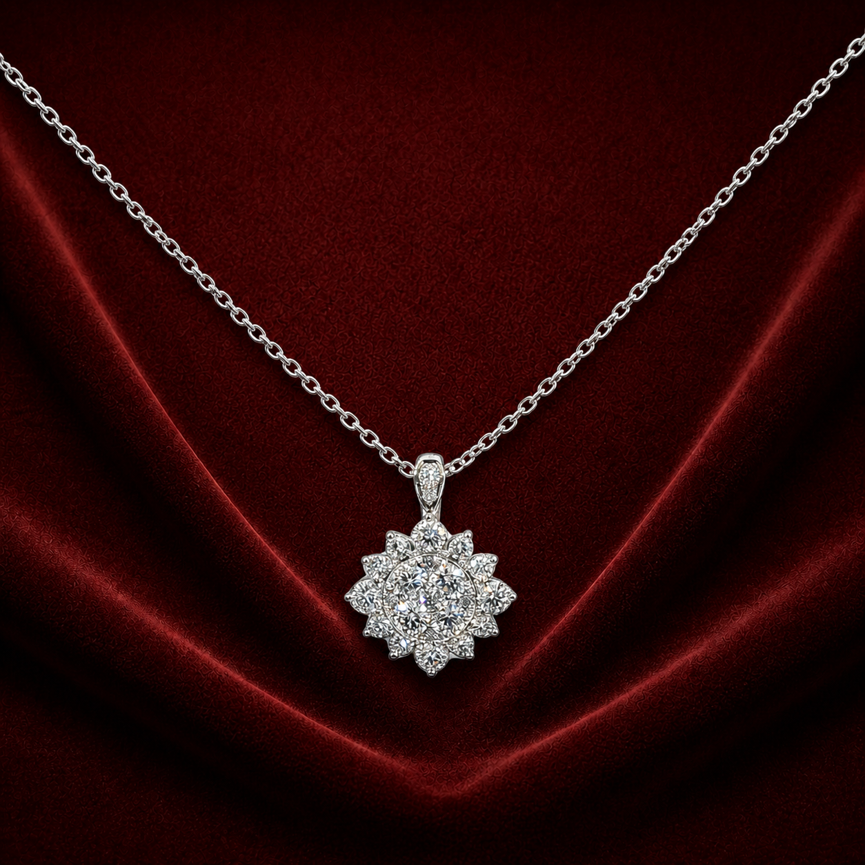 ENS2122 floral halo diamond pendant necklace on deep burgundy velvet