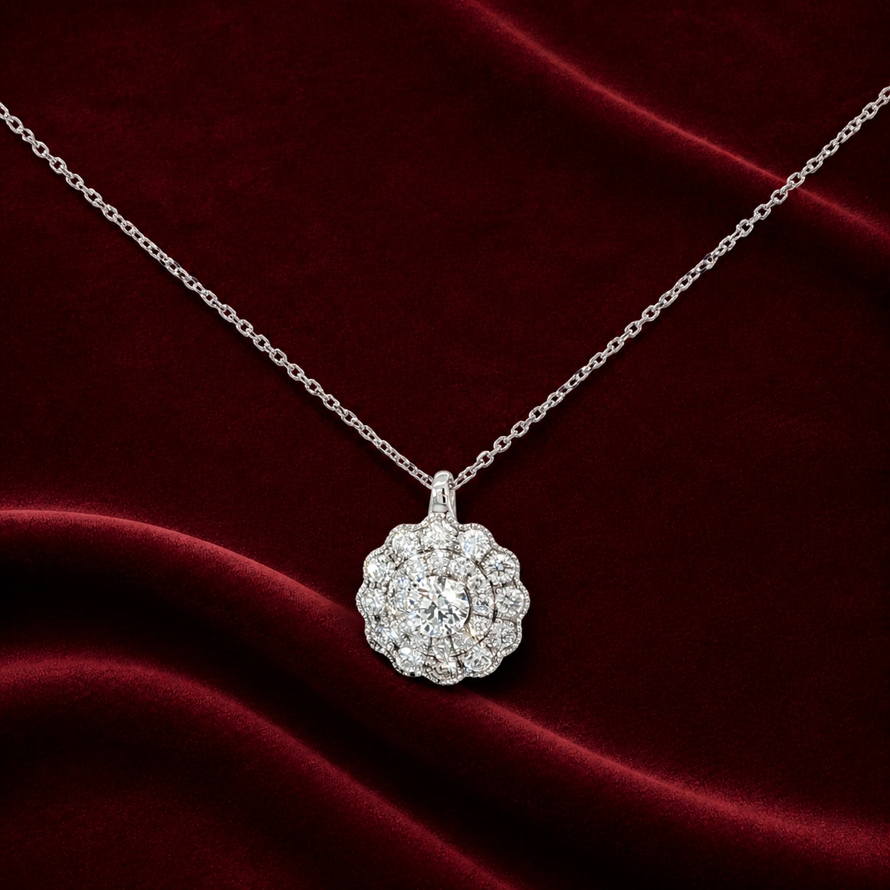 ENS3222 floral scalloped halo pendant necklace on deep burgundy velvet