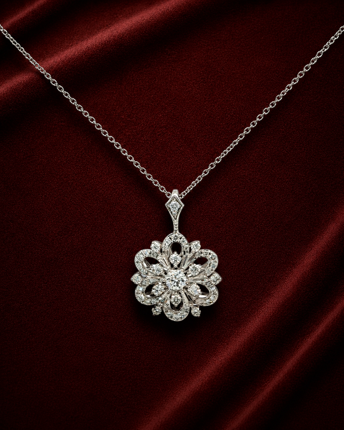 ENS5190 floral diamond pendant necklace on deep burgundy velvet