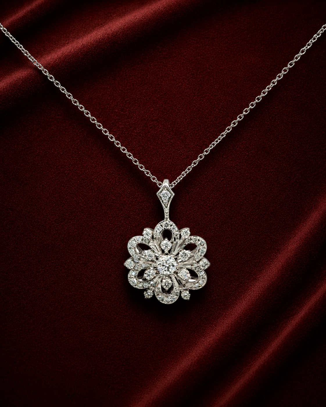 ENS5190 floral diamond pendant necklace on deep burgundy velvet
