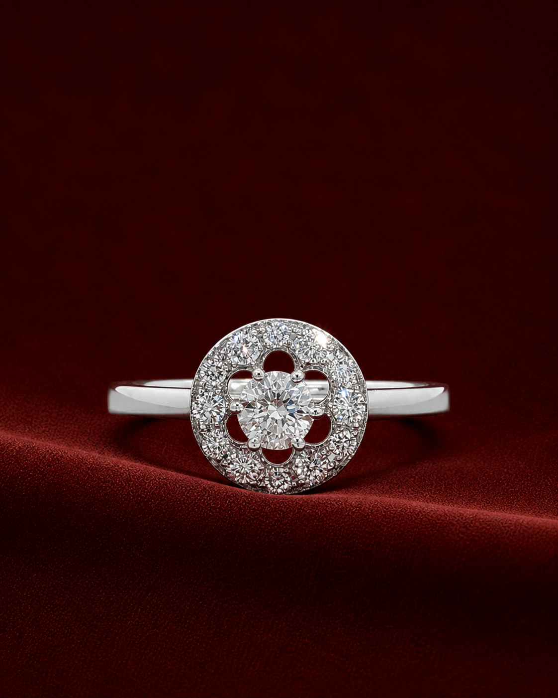 ERJ2432 floral halo diamond ring on deep burgundy velvet