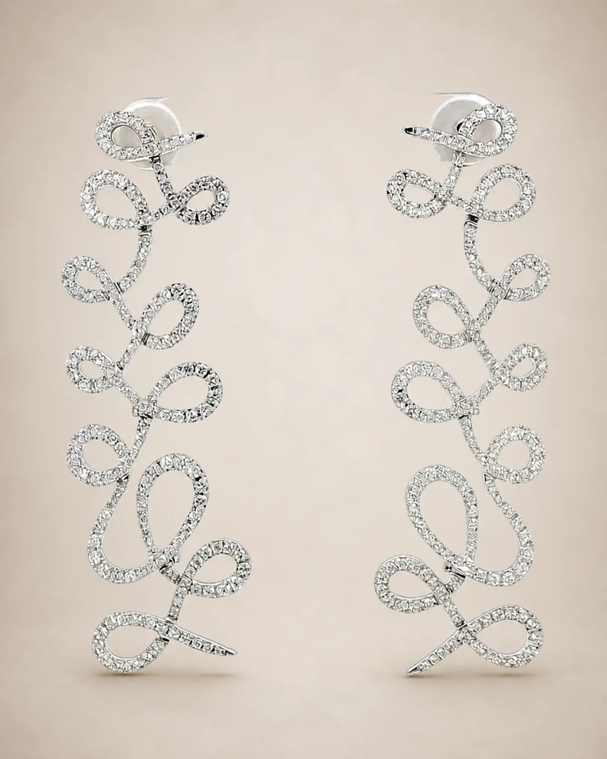 Close-up of ThienPo diamond loop earrings