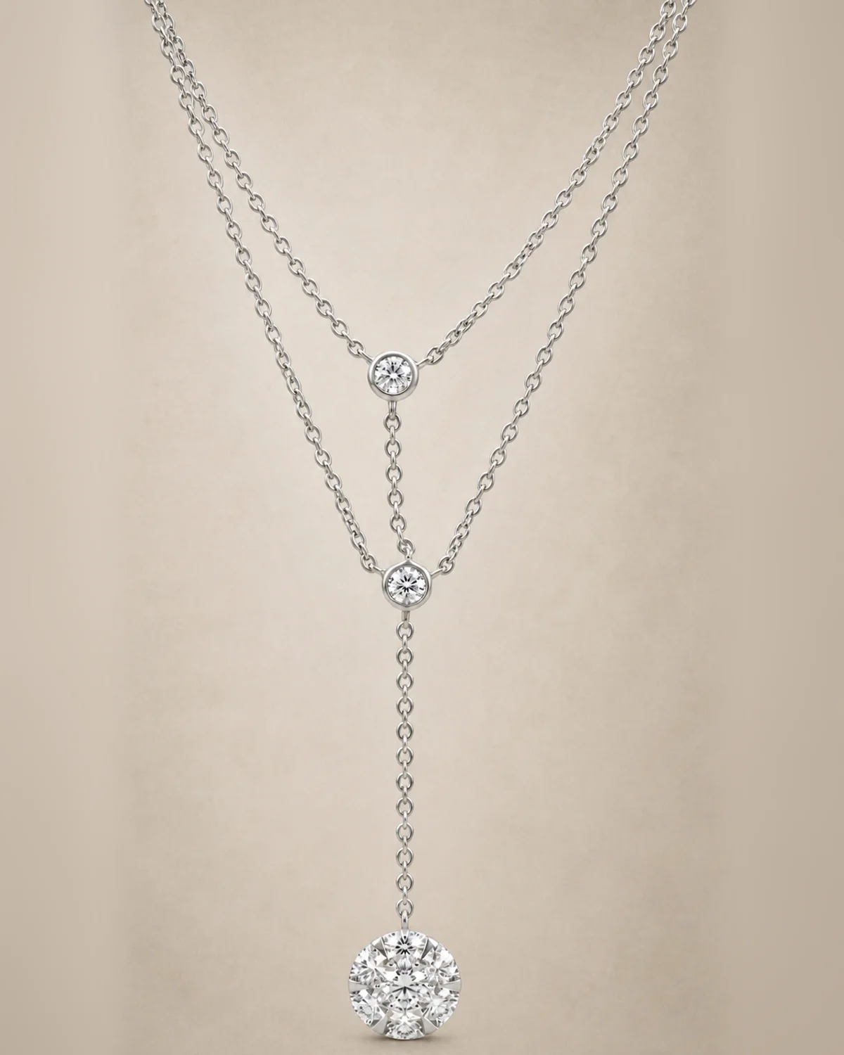 Close-up of a ThienPo layered white gold diamond necklace