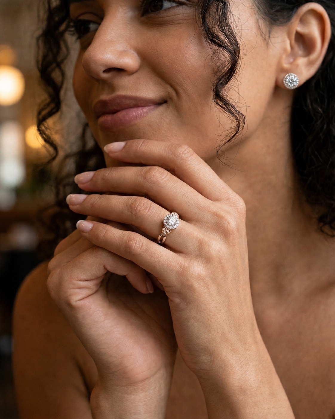 Model wearing ThienPo diamond earrings and ring